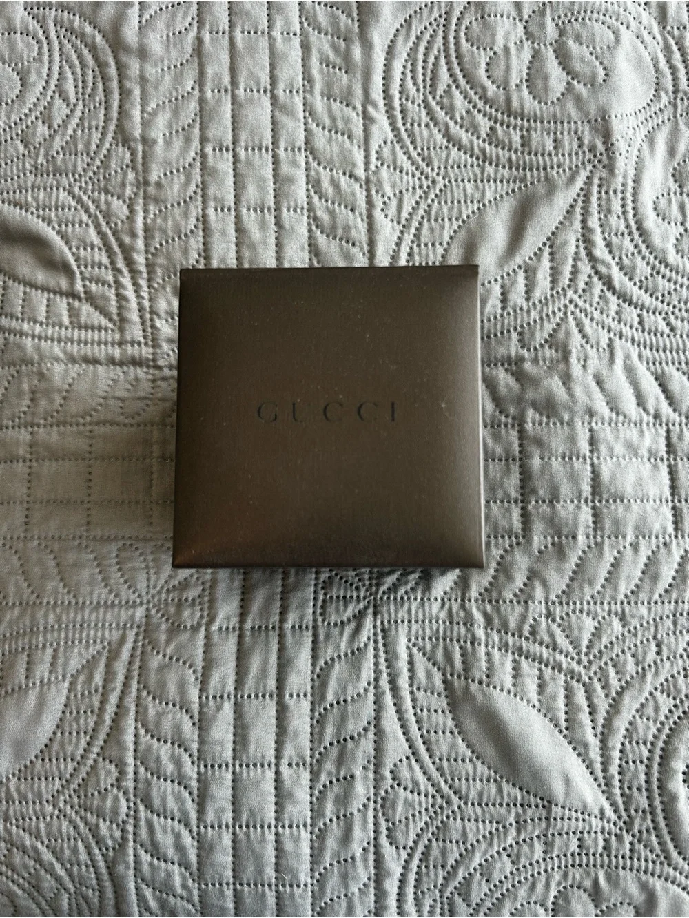 Gucci Men's Silver Wristwatch With Black Leather Strap.